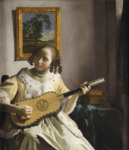 Девушка, играющая на гитаре