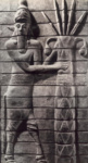 Божество в виде человека-быка с пальмой. Фрагмент рельефа из Суз