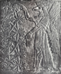 Крылатое божество с головой орла. Рельеф из дворца Ашшур-нацир-апала II